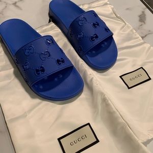 Gucci blue rubber slides